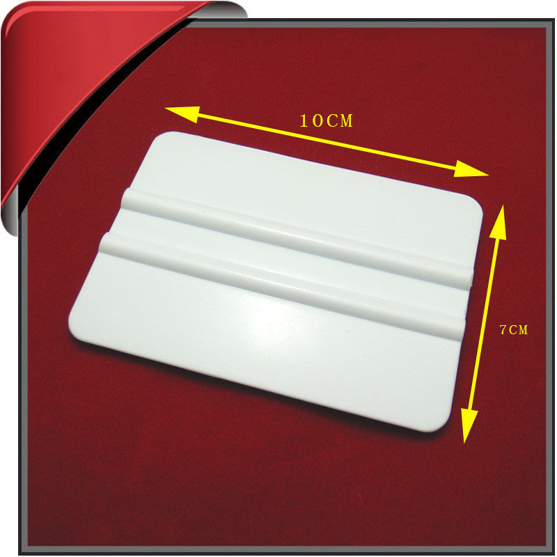 Automotive film scraper