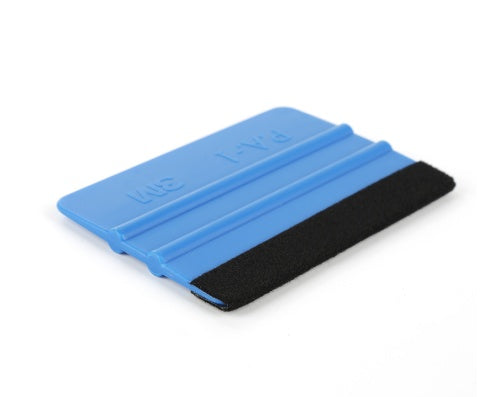 Automotive film scraper
